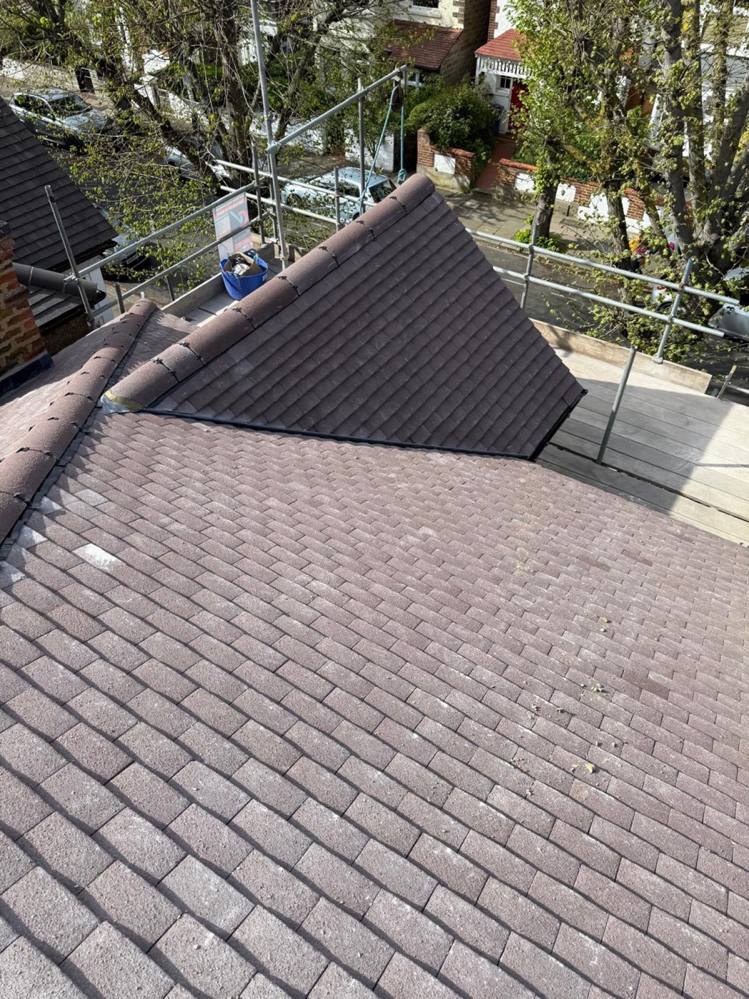 Full plain-tile re-roof finished, main slope and hipped section